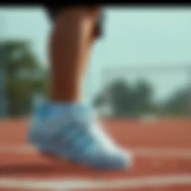 Child wearing Adidas Superstar shoes during a sporting activity
