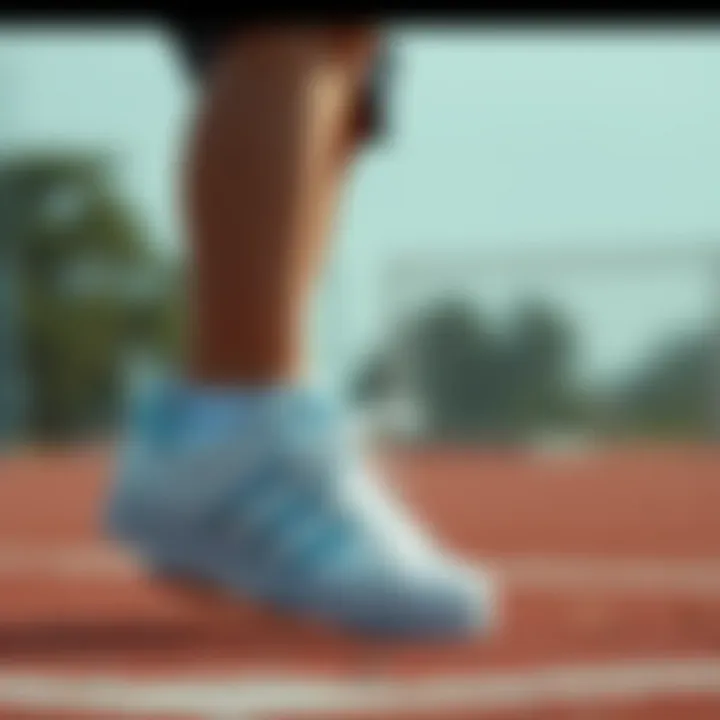 Child wearing Adidas Superstar shoes during a sporting activity