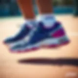 Vibrant Asics volleyball shoes for young girls in action