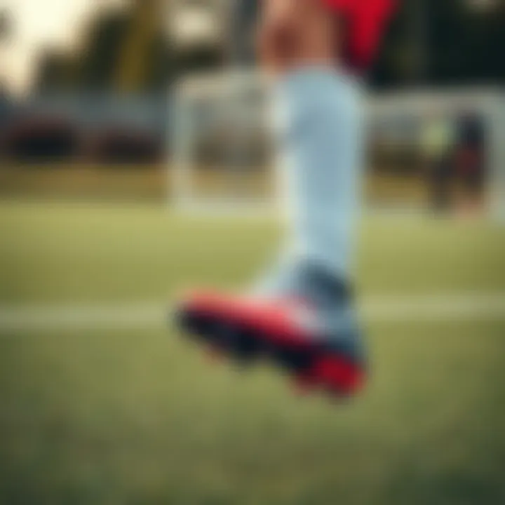 Agility Demonstrated in Nike Air Zoom Children's Football Boots Young athlete wearing Nike Air Zoom boots demonstrating agility on the field.